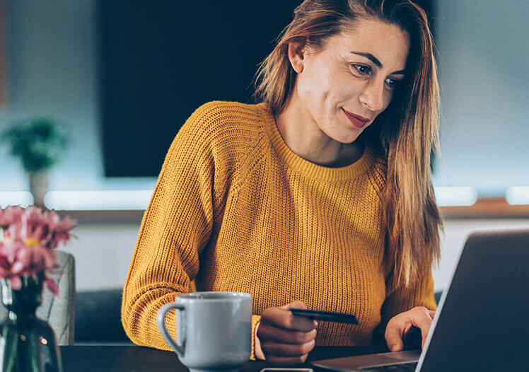 Woman shopping on her computer